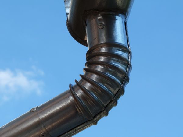 Metal Downspout Installation in Denver