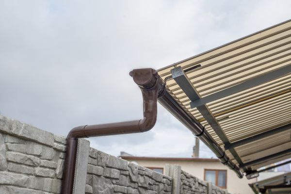 Plastic Downspout Installation in Denver